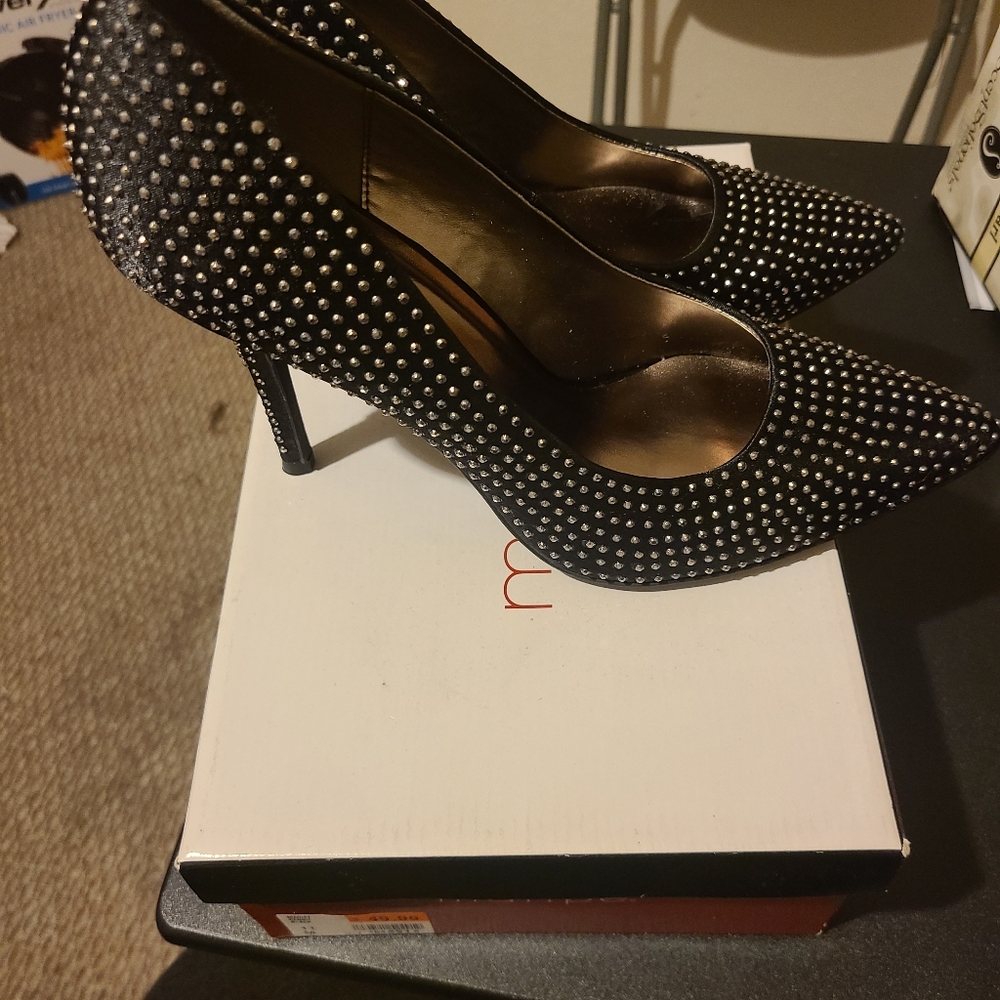 Black studded high heel shoes